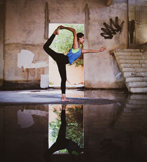 Woman performing a light cardio exercise in a calm environment.